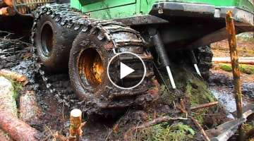 John Deere 1110D in mud, difficult conditions